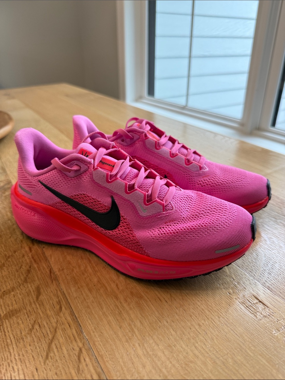 Nike Women's Hot Pink Running Sneakers with Black Swoosh
